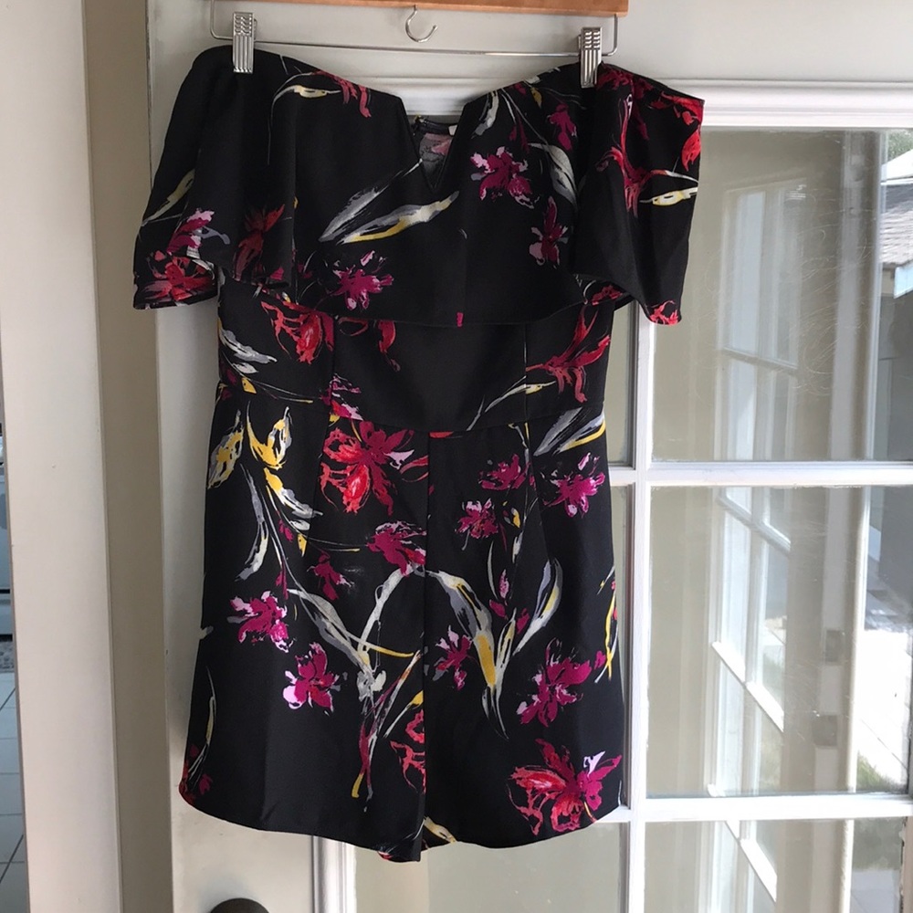 Super cute black floral romper!
